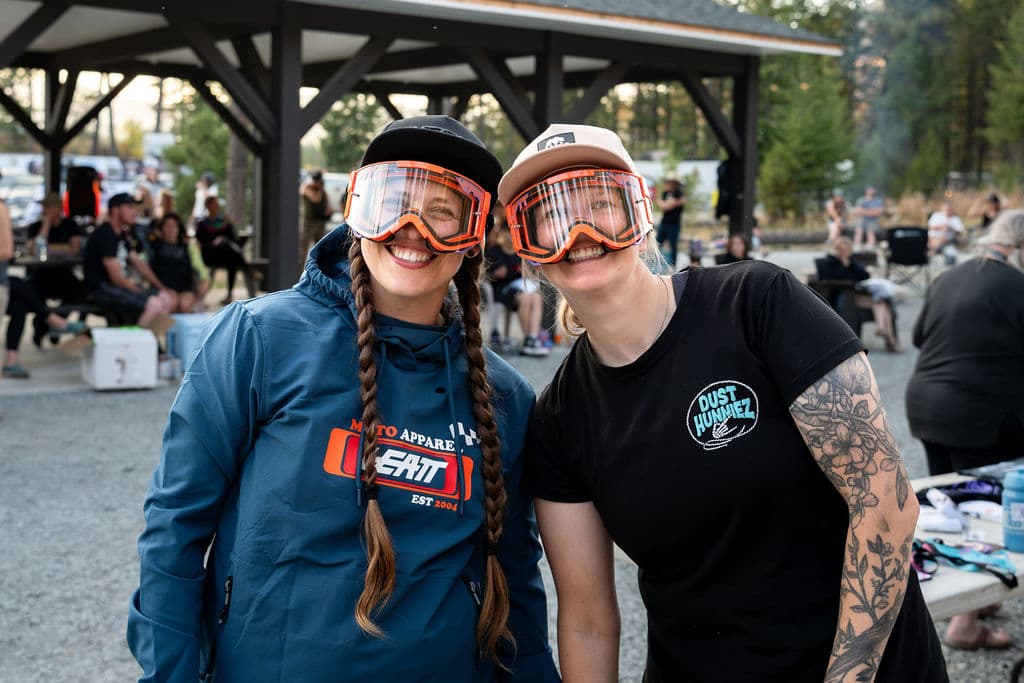 Two riders laughing together in their goggles at Fall Throttle.