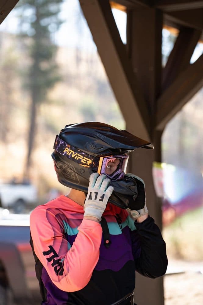 Portrait of Katie in riding gear.