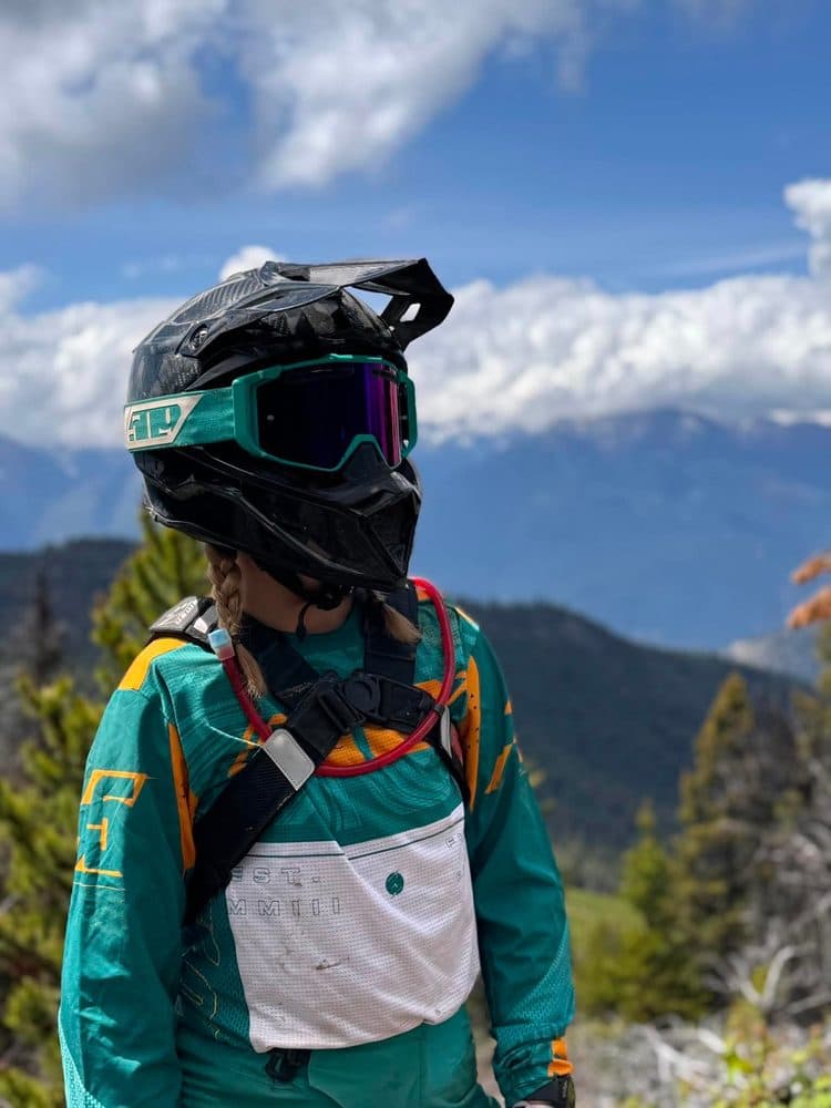 Portrait of Shannon in riding gear.